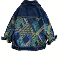A Stylish Denim Jacket Featuring Playful And Unique Colorful Geometric Patterns